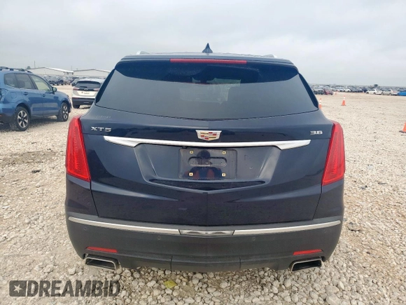 2017 Cadillac XT5 FWD with VIN 1GYKNARS8HZ162612, listed as a Copart auction lot 58727265 with 100,494 mi miles and Clean title. Bid and sale history available at DreamBid. Image 6.