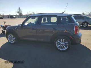 2014 MINI Countryman S with VIN WMWZC3C57EWP29072, listed as a Copart auction lot 88071195 with 105,183 mi miles and Clean Title. Bid and sale history available at DreamBid. Image 2.