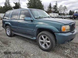 1999 GMC Denali z VIN 1GKEK13R6XR918944, wystawiony jako Copart lot #46049675 z przebiegiem 140 826 mil mil oraz Tytuł czysty. Historia ofert i sprzedaży dostępna na DreamBid. Obrazek 4.