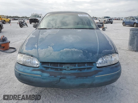 1997 Chevrolet Lumina LS with VIN 2G1WL52M1V9120300, listed as a Copart auction lot 87460394 with 142,588 mi miles and Salvage Title. Bid and sale history available at DreamBid. Image 5.