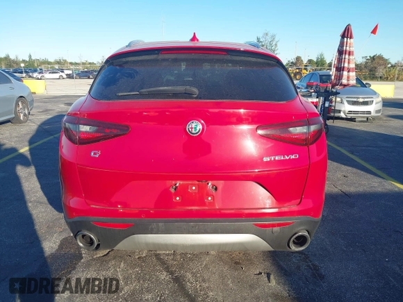 2018 Alfa Romeo Stelvio z VIN ZASFAKAN3J7C20066, wystawiony jako IAAI lot #40879859 z przebiegiem 50 131 mil mil oraz . Historia ofert i sprzedaży dostępna na DreamBid. Obrazek 17.