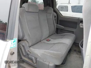 2005 Ford Freestar SE z VIN 2FMZA516X5BA42620, wystawiony jako IAAI lot #42163183 z przebiegiem 93 141 mil mil oraz . Historia ofert i sprzedaży dostępna na DreamBid. Obrazek 8.