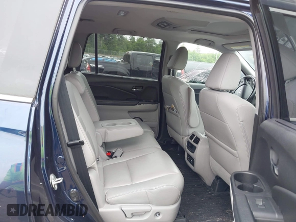 2017 Honda Pilot Touring with VIN 5FNYF6H99HB093136, listed as a IAAI auction lot 42507326 with 125,579 mi miles and . Bid and sale history available at DreamBid. Image 8.