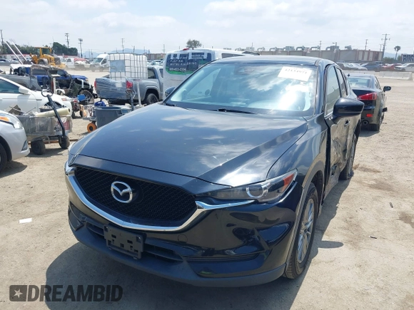 2017 Mazda CX-5 Touring with VIN JM3KFACL0H0124632, listed as a IAAI auction lot 42134971 with 107,029 mi miles and . Bid and sale history available at carsss.com. Image 17.
