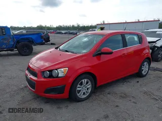 2013 Chevrolet Sonic LT with VIN 1G1JC6SHXD4172738, listed as a IAAI auction lot 41872916 with 105,829 mi miles. Bid and sale history available at carsss.com. Image 2.