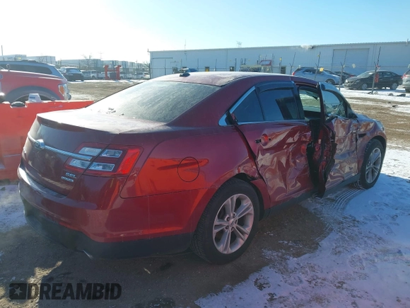 2015 Ford Taurus SEL z VIN 1FAHP2E85FG163421, wystawiony jako IAAI lot #41320489 z przebiegiem 165 618 mil mil oraz . Historia ofert i sprzedaży dostępna na DreamBid. Obrazek 4.