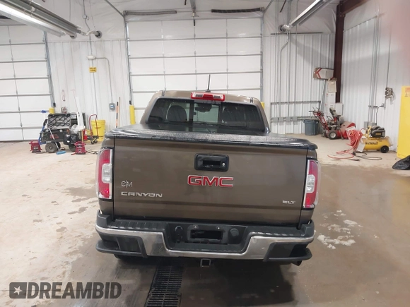 2016 GMC Canyon 4WD SLT z VIN 1GTP6DE13G1229783, wystawiony jako IAAI lot #41583360 z przebiegiem 80 149 mil mil oraz . Historia ofert i sprzedaży dostępna na DreamBid. Obrazek 17.