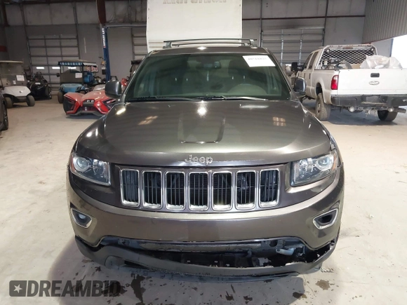 2014 Jeep Grand Cherokee Laredo with VIN 1C4RJEAG7EC145023, listed as a IAAI auction lot 40518825 with 115,098 mi miles and . Bid and sale history available at DreamBid. Image 12.