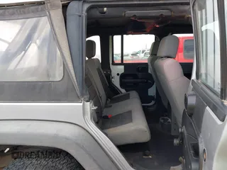 2008 Jeep Wrangler Unlimited X with VIN 1J4GA39198L651172, listed as a IAAI auction lot 41936521 with 69,007 mi miles and . Bid and sale history available at DreamBid. Image 8.