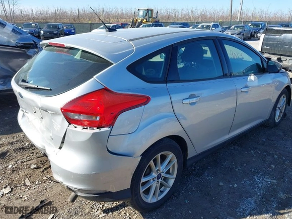 2015 Ford Focus SE with VIN 1FADP3K22FL202879, listed as a IAAI auction lot 41724039 with 169,240 mi miles. Bid and sale history available at carsss.com. Image 4.