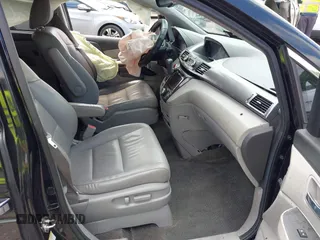 2014 Honda Odyssey Touring with VIN 5FNRL5H94EB057499, listed as a IAAI auction lot 41983956 with 158,573 mi miles and . Bid and sale history available at DreamBid. Image 5.