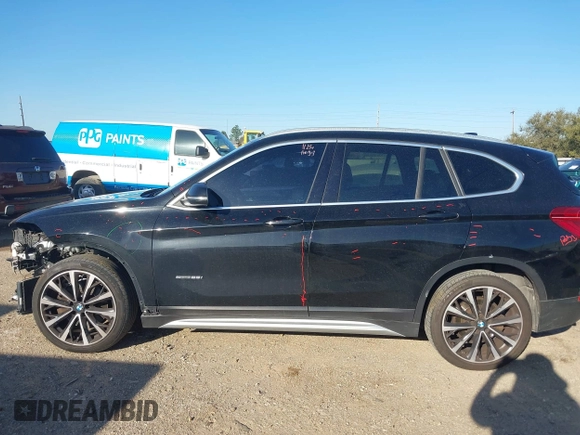2018 BMW X1 sDrive28i with VIN WBXHU7C30J5L04913, listed as a IAAI auction lot 41755344 with 101,867 mi miles. Bid and sale history available at carsss.com. Image 15.