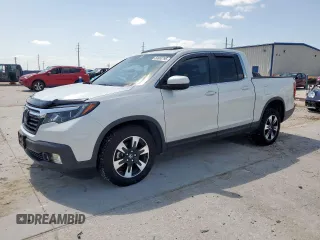 2020 Honda Ridgeline RTL with VIN 5FPYK3F57LB031244, listed as a Copart auction lot 58863795 with 54,318 mi miles and Salvage title. Bid and sale history available at DreamBid. Image 1.