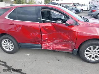 2018 Chevrolet Equinox LT with VIN 2GNAXJEV1J6129715, listed as a IAAI auction lot 41546715 with 143,941 mi miles. Bid and sale history available at carsss.com. Image 6.