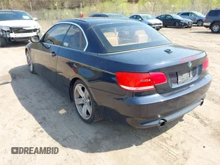 2010 BMW 3 Series 335i with VIN WBAWL7C59AP475993, listed as a IAAI auction lot 42112968 with 101,373 mi miles. Bid and sale history available at carsss.com. Image 3.