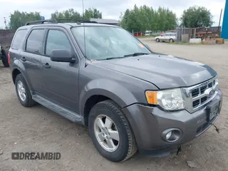 2011 Ford Escape XLT z VIN 1FMCU9D73BKA87277, wystawiony jako IAAI lot #42662242 z przebiegiem 207 649 mil mil oraz . Historia ofert i sprzedaży dostępna na DreamBid. Obrazek 1.