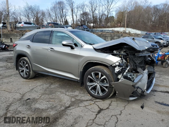2018 Lexus RX with VIN 2T2BZMCA2JC161057, listed as a Copart auction lot 49801635 with 84,870 mi miles and Salvage Title. Bid and sale history available at carsss.com. Image 4.