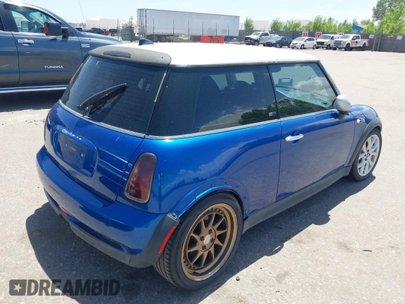 2006 MINI Hardtop S with VIN WMWRE33576TL24276, listed as a IAAI auction lot 42278094 with 148,269 mi miles and . Bid and sale history available at DreamBid. Image 4.