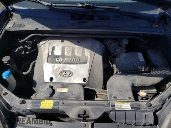 2005 Hyundai Tucson GL with VIN KM8JM72D55U167063, listed as a Copart auction lot 52002865 with 157,945 mi miles and Salvage Title. Bid and sale history available at carsss.com. Image 11.