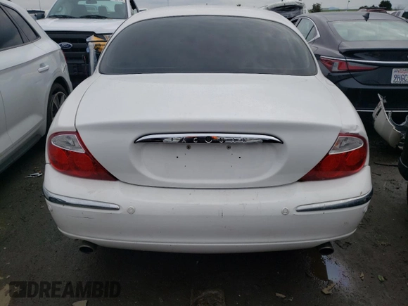 2003 Jaguar S-Type with VIN SAJEA01T43FM87170, listed as a Copart auction lot 41265364 with 79,273 mi miles and Non Repairable. Bid and sale history available at DreamBid. Image 6.