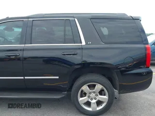 2015 Chevrolet Tahoe LT with VIN 1GNSCBKC4FR145119, listed as a IAAI auction lot 42309931 with 99,408 mi miles and . Bid and sale history available at DreamBid. Image 19.