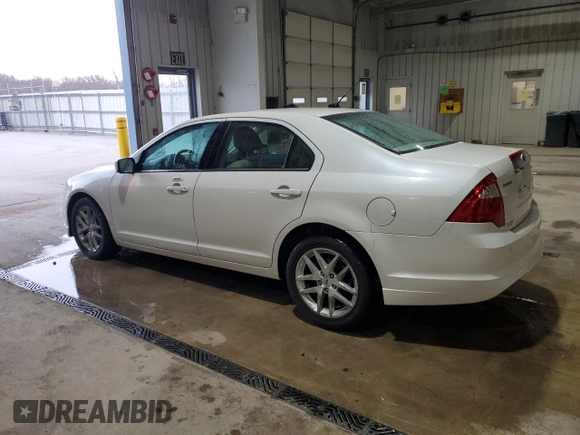 2012 Ford Fusion SEL with VIN 3FAHP0JA9CR167134, listed as a Copart auction lot 50869835 with 128,956 mi miles and Salvage Title. Bid and sale history available at DreamBid. Image 2.