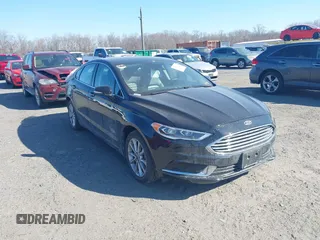 2018 Ford Fusion Energi SE with VIN 3FA6P0PU8JR152890, listed as a IAAI auction lot 41682965 with 84,890 mi miles. Bid and sale history available at carsss.com. Image 1.