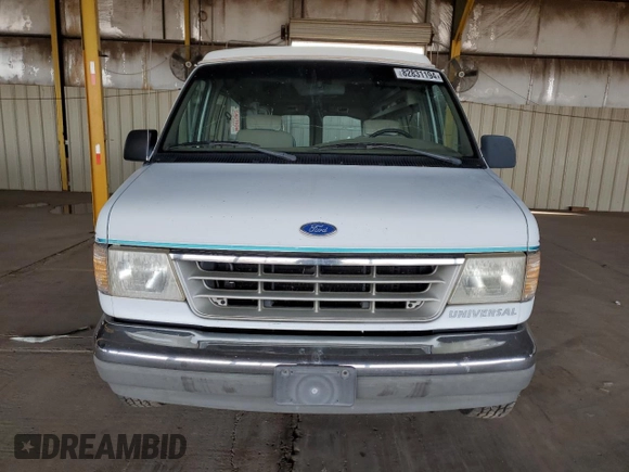 1992 Ford Econoline Cargo z VIN 1FDEE14H7NHA94279, wystawiony jako Copart lot #82831194 z przebiegiem Nie podano mil oraz Czysty tytuł • Clean title. Historia ofert i sprzedaży dostępna na DreamBid. Obrazek 5.