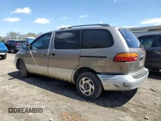 1999 Toyota Sienna LE with VIN 4T3ZF13C2XU112113, listed as a Copart auction lot 52162655 with 248,091 mi miles and Salvage Title. Bid and sale history available at carsss.com. Image 2.