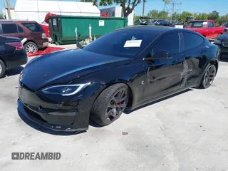 2023 Tesla Model S Plaid with VIN 5YJSA1E67PF528171, listed as a IAAI auction lot 41831086 with Not provided miles and . Bid and sale history available at DreamBid. Image 16.
