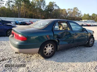 1997 Buick Regal GS with VIN 2G4WF5211V1479225, listed as a Copart auction lot 75203384 with 65,859 mi miles and Salvage Title. Bid and sale history available at carsss.com. Image 3.