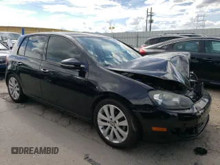 2012 Volkswagen Golf TDI with VIN WVWNM7AJ9CW148367, listed as a Copart auction lot 69002904 with 77,987 mi miles and Salvage title. Bid and sale history available at DreamBid. Image 4.
