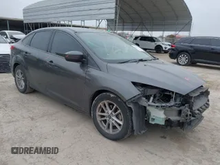 2018 Ford Focus SE with VIN 1FADP3F29JL269000, listed as a IAAI auction lot 41630271 with 75,073 mi miles. Bid and sale history available at carsss.com. Image 1.