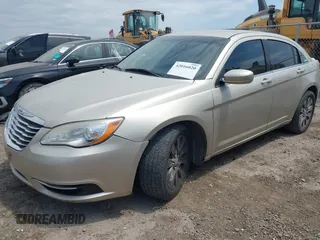 2013 Chrysler 200 LX with VIN 1C3CCBAB2DN733471, listed as a IAAI auction lot 42016020 with 182,681 mi miles and . Bid and sale history available at DreamBid. Image 2.