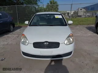 2011 Hyundai Accent GLS with VIN KMHCN4AC0BU613032, listed as a IAAI auction lot 42089042 with 132,518 mi miles. Bid and sale history available at carsss.com. Image 6.