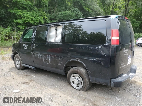 2015 Chevrolet Express Passenger LS with VIN 1GAWGPFG0F1141701, listed as a Copart auction lot 62818685 with 63,219 mi miles and Salvage title. Bid and sale history available at DreamBid. Image 2.
