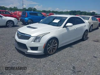 2016 Cadillac ATS-V with VIN 1G6AN5RY5G0151103, listed as a IAAI auction lot 39630850 with 37,000 mi miles. Bid and sale history available at carsss.com. Image 2.