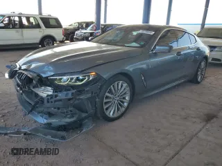 2020 BMW 8 Series 840i with VIN WBAGV2C09LCD92695, listed as a Copart auction lot 73230034 with 42,440 mi miles and Salvage Title. Bid and sale history available at carsss.com. Image 1.