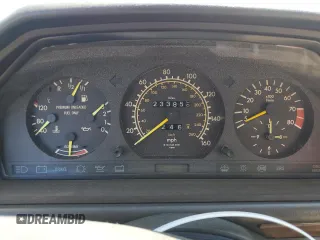 1990 Mercedes-Benz 300 CE with VIN WDBEA51D7LB137591, listed as a Copart auction lot 49811234 with 23,385 mi miles and Salvage Title. Bid and sale history available at carsss.com. Image 9.