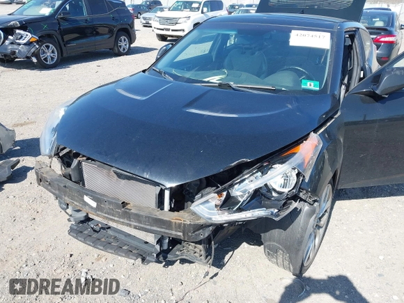2013 Hyundai Veloster w/Gray Int with VIN KMHTC6AD4DU131242, listed as a IAAI auction lot 42074517 with 76,713 mi miles and . Bid and sale history available at DreamBid. Image 6.