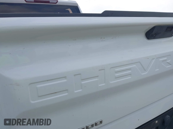 2021 Chevrolet Silverado 1500 Work Truck with VIN 1GCRYAEF0MZ210103, listed as a IAAI auction lot 41895696 with 80,098 mi miles and . Bid and sale history available at DreamBid. Image 19.