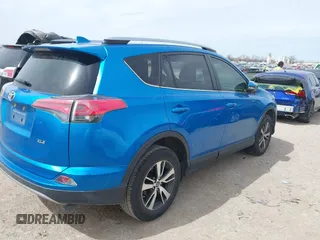 2018 Toyota RAV4 XLE with VIN JTMWFREV2JJ752568, listed as a IAAI auction lot 41795891 with 37,886 mi miles. Bid and sale history available at carsss.com. Image 4.