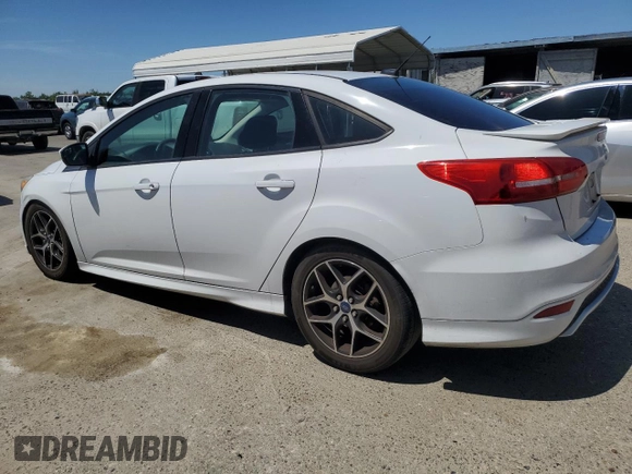 2016 Ford Focus SE with VIN 1FADP3F22GL329241, listed as a Copart auction lot 58095135 with 105,079 mi miles and Salvage title. Bid and sale history available at DreamBid. Image 2.