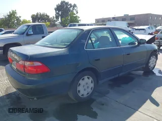 1999 Honda Accord LX with VIN JHMCG6659XC019748, listed as a IAAI auction lot 42141554 with 331,904 mi miles and . Bid and sale history available at DreamBid. Image 4.