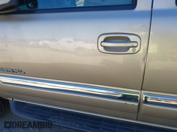 2005 GMC Yukon XL SLE with VIN 1GKEC16Z95R172186, listed as a IAAI auction lot 41659861 with 130,305 mi miles and . Bid and sale history available at DreamBid. Image 12.
