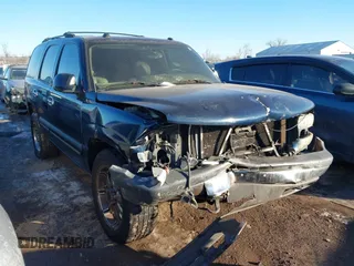 2004 Chevrolet Tahoe LS with VIN 1GNEK13ZX4J169899, listed as a IAAI auction lot 41422300 with 1 mi miles. Bid and sale history available at carsss.com. Image 1.