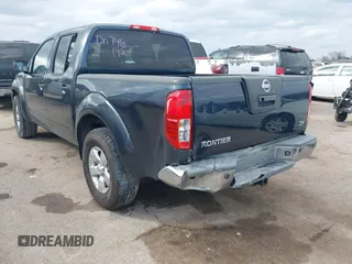 2013 Nissan Frontier SV with VIN 1N6AD0ER3DN746142, listed as a IAAI auction lot 41519017 with 166,482 mi miles and . Bid and sale history available at DreamBid. Image 3.
