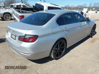 2014 BMW 5 Series 528i xDrive with VIN WBA5A7C5XED612822, listed as a IAAI auction lot 41701488 with 120,939 mi miles and . Bid and sale history available at DreamBid. Image 4.