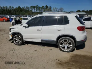2012 Volkswagen Tiguan SEL with VIN WVGAV7AX9CW530331, listed as a Copart auction lot 50129405 with 141,387 mi miles and Salvage Title. Bid and sale history available at DreamBid. Image 2.