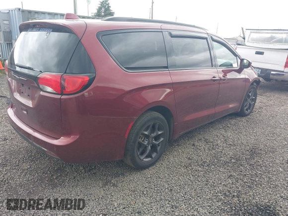 2020 Chrysler Pacifica Touring with VIN 2C4RC1FG6LR142887, listed as a IAAI auction lot 42260931 with 50,008 mi miles and . Bid and sale history available at DreamBid. Image 4.